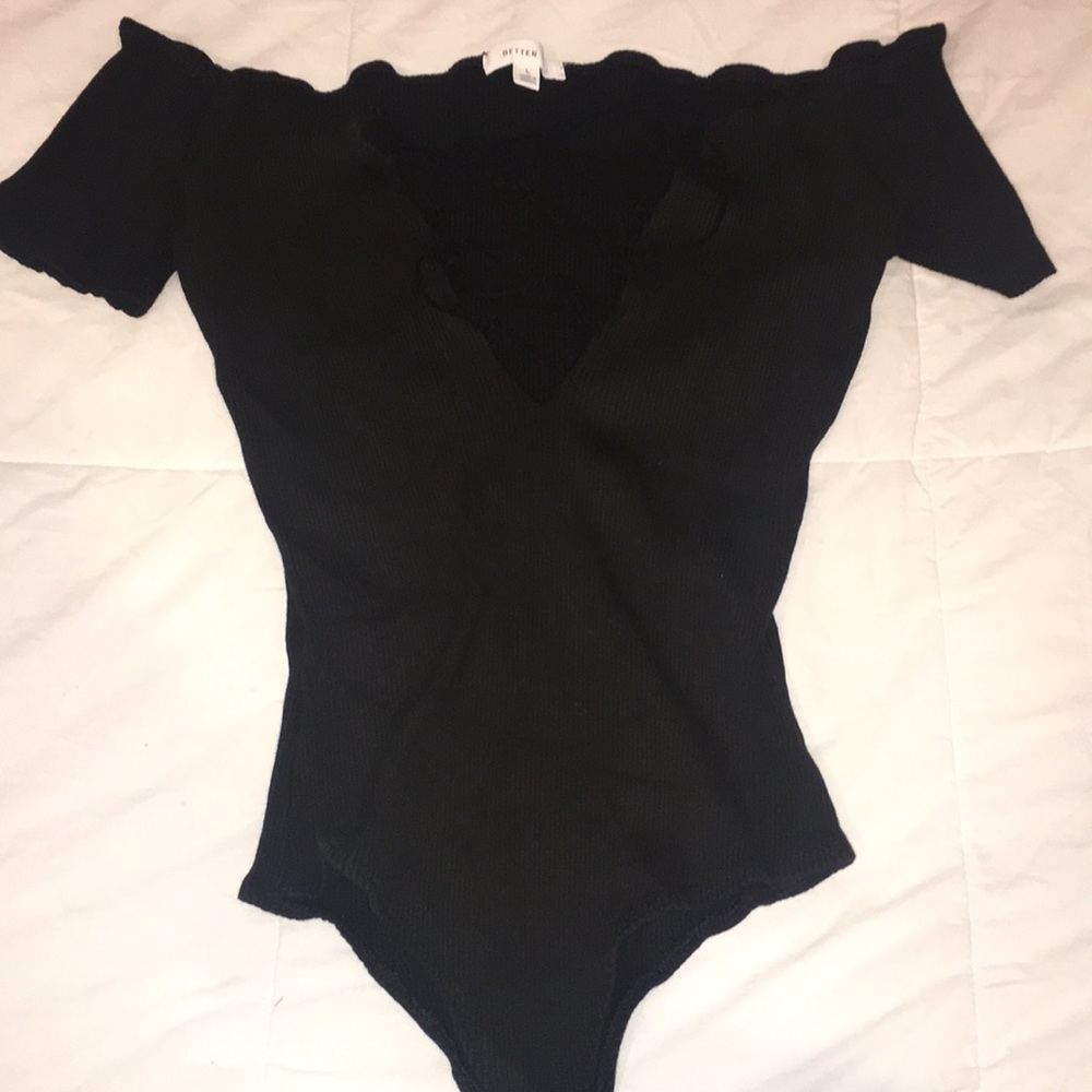 Black body suit with cleavage corset